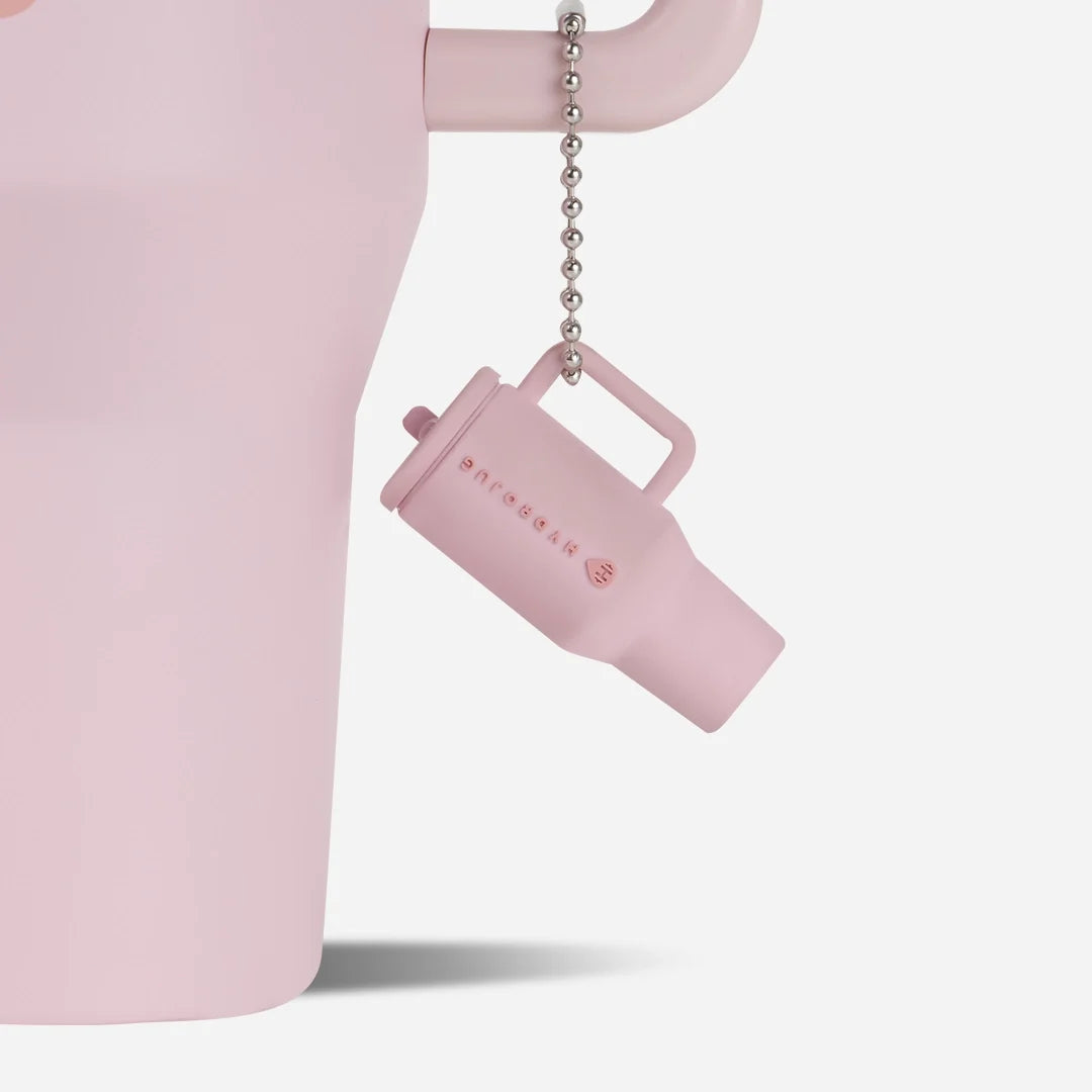 traveler-keychain-a3 Web-TravelerKeychainPhotos-PinkSand2.webp